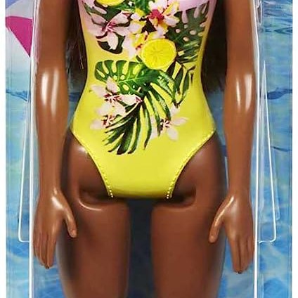 Barbie Doll Features Long Brunette Hair And Stylish Floral Swimsuit.