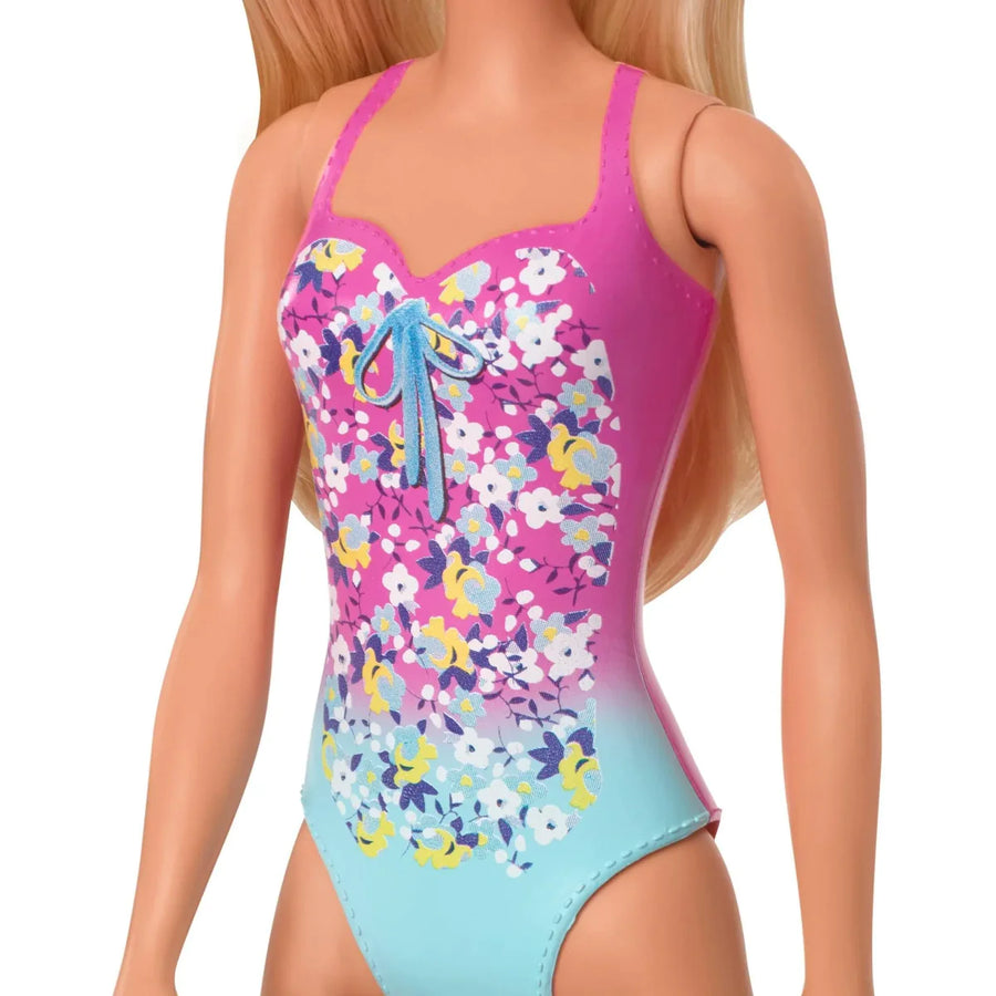 Barbie's Swimsuit Beach Doll Blonde Hair and a Pink Floral Print Suit