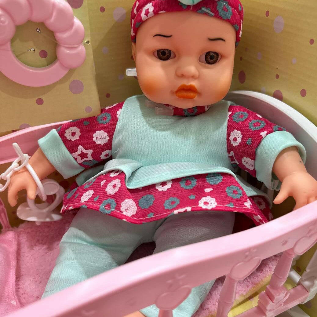 Adorable Realistic Baby Doll  in white crib, perfect for a nursery decor